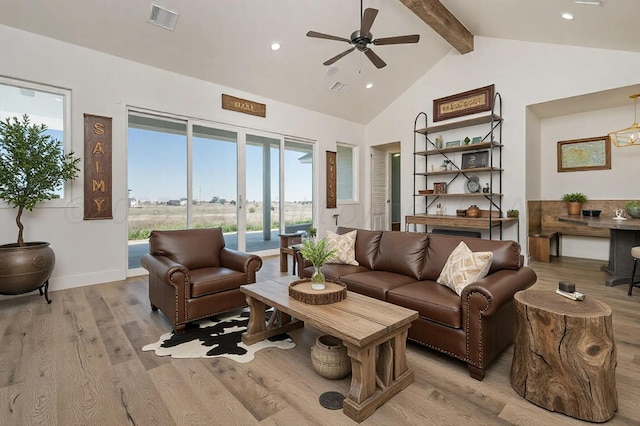 living area with recessed lighting, visible vents, baseboards, light wood-type flooring, and beam ceiling