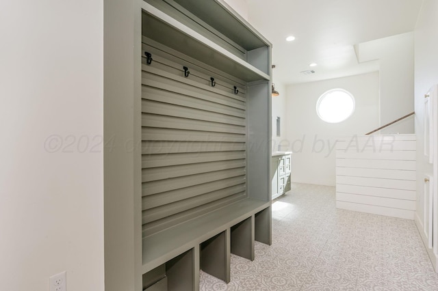 mudroom featuring visible vents and recessed lighting