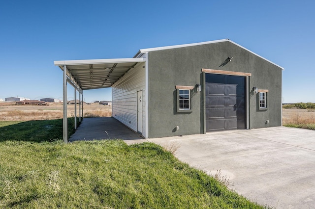 exterior space with concrete driveway