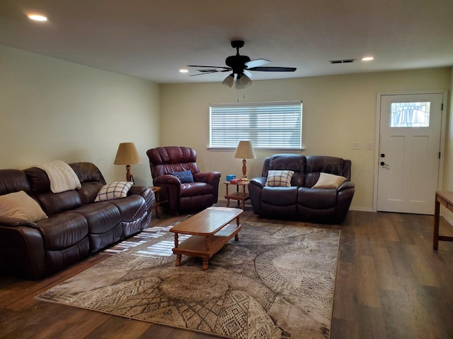 living room with ceiling fan and hardwood / wood-style floors