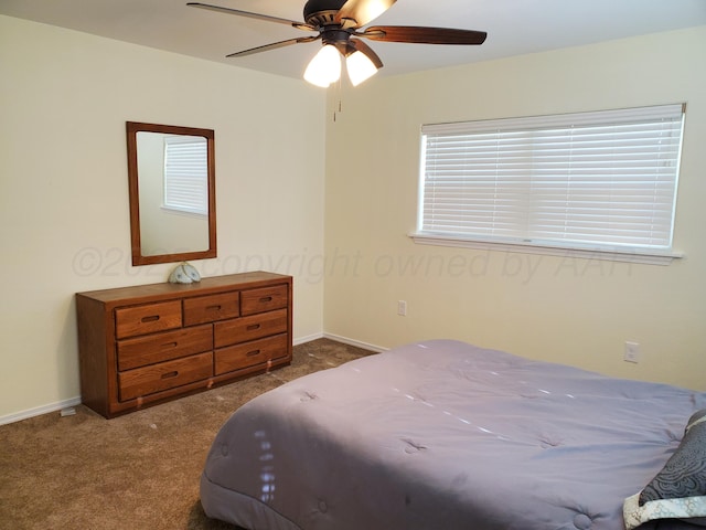 bedroom with carpet flooring and ceiling fan