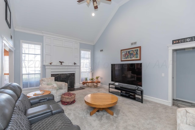 living room featuring light colored carpet, high vaulted ceiling, ceiling fan, and crown molding