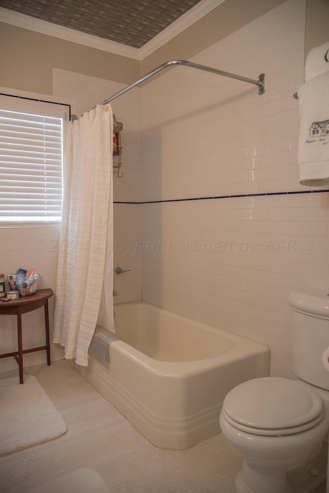 2122 S Hayden St, Amarillo, TX 79109 - bathroom featuring ornamental molding, shower / bath combo with shower curtain, and tile walls