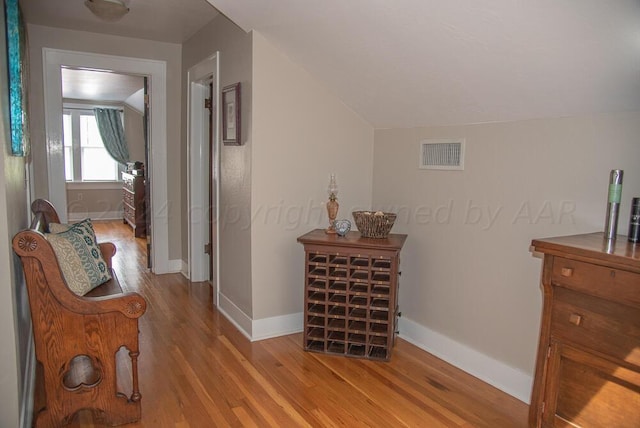 2122 S Hayden St, Amarillo, TX 79109 - hall with light wood finished floors and vaulted ceiling