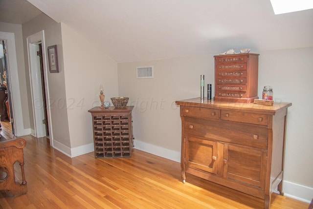 2122 S Hayden St, Amarillo, TX 79109 - detailed view of wood finished floors and a skylight