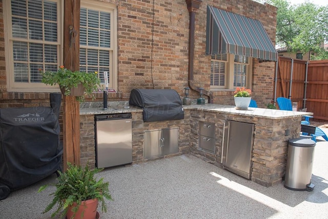 2122 S Hayden St, Amarillo, TX 79109 - view of patio with area for grilling