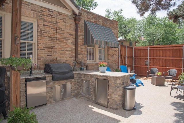2122 S Hayden St, Amarillo, TX 79109 - view of patio with area for grilling