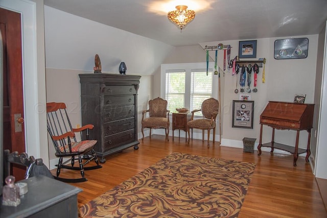 2122 S Hayden St, Amarillo, TX 79109 - living area with wood finished floors and vaulted ceiling