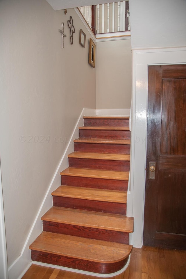 2122 S Hayden St, Amarillo, TX 79109 - staircase featuring hardwood / wood-style floors