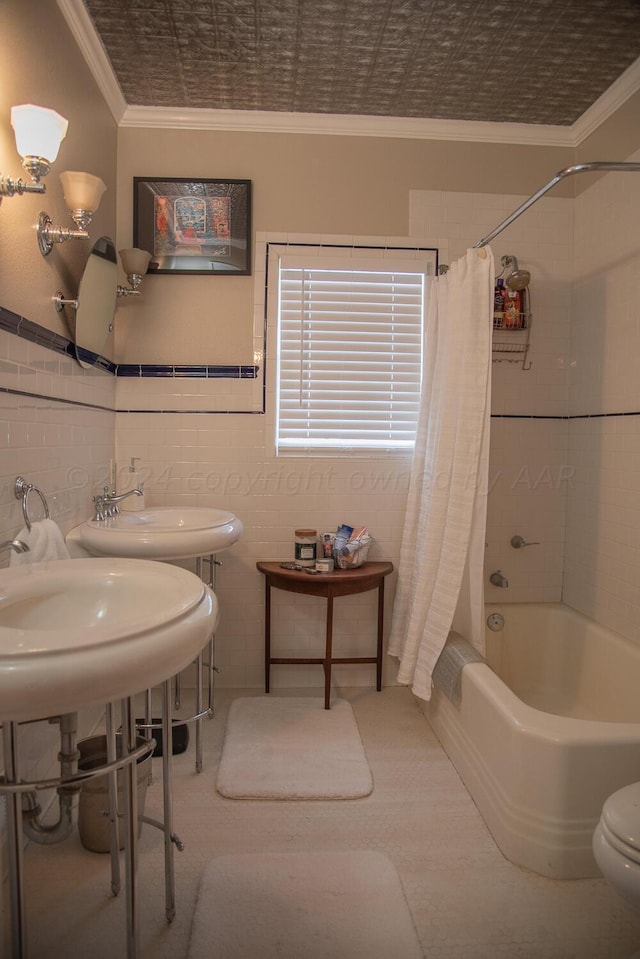 2122 S Hayden St, Amarillo, TX 79109 - bathroom featuring crown molding, shower / bath combo, and tile walls