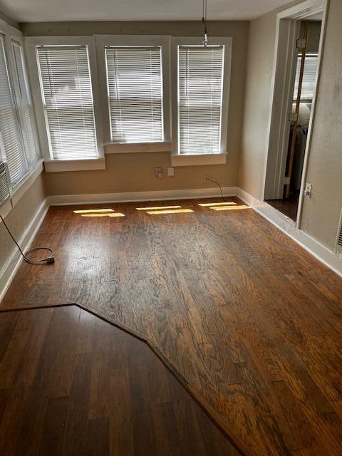 2122 S Hayden St, Amarillo, TX 79109 - unfurnished room with wood finished floors and healthy amount of natural light