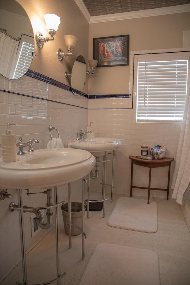 2122 S Hayden St, Amarillo, TX 79109 - full bathroom with ornamental molding, tile walls, and a shower with shower curtain
