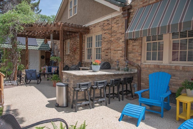 2122 S Hayden St, Amarillo, TX 79109 - view of patio featuring a pergola and an outdoor structure