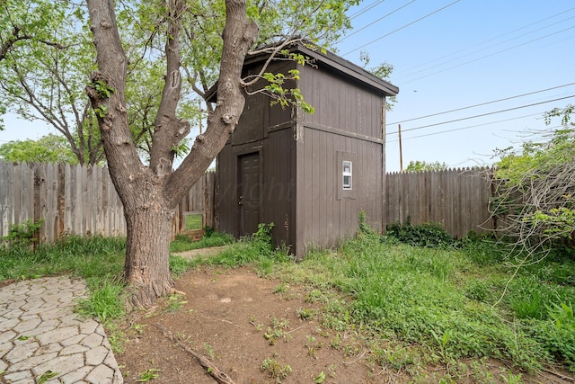 view of outbuilding featuring an outbuilding and a fenced backyard