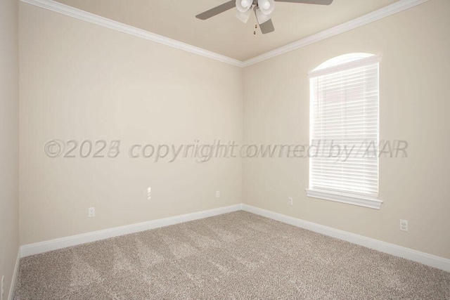 empty room with ornamental molding, carpet floors, and ceiling fan