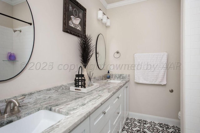 bathroom featuring ornamental molding, toilet, and vanity