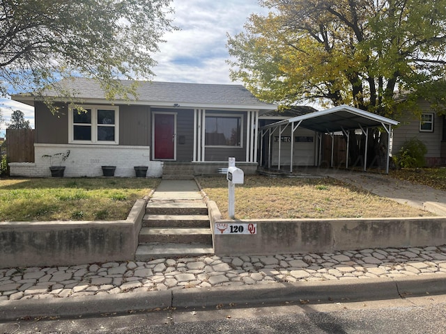 view of front of home with a carport