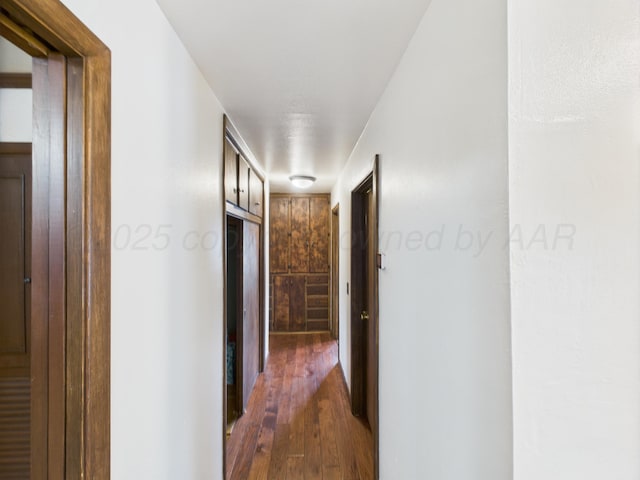 317 Morton Ave, Dumas, TX 79029 - hall with dark wood-style floors