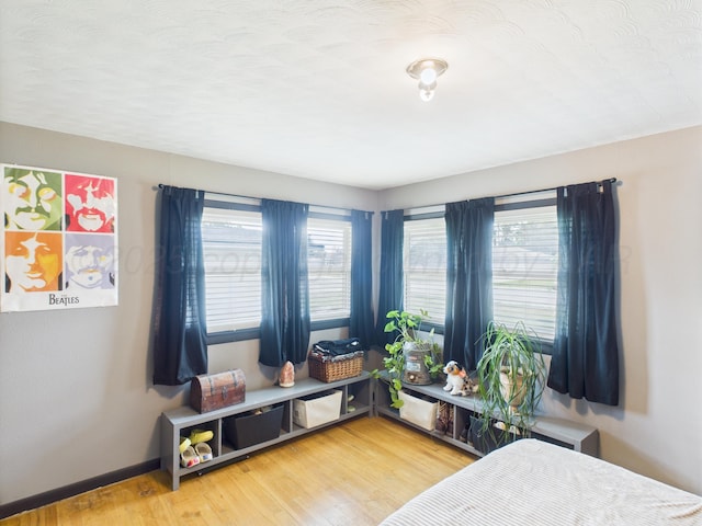 317 Morton Ave, Dumas, TX 79029 - bedroom featuring light wood-type flooring