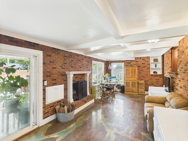 317 Morton Ave, Dumas, TX 79029 - living room featuring a fireplace, brick wall, beamed ceiling, and concrete floors