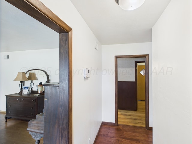 317 Morton Ave, Dumas, TX 79029 - hall featuring wood finished floors and baseboards