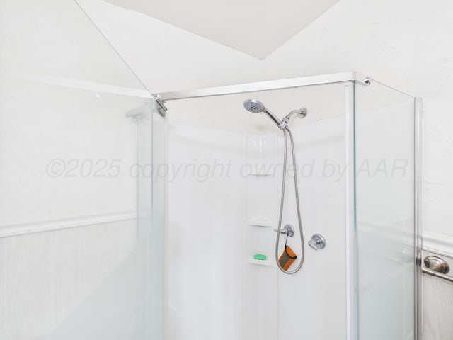 317 Morton Ave, Dumas, TX 79029 - bathroom featuring a stall shower