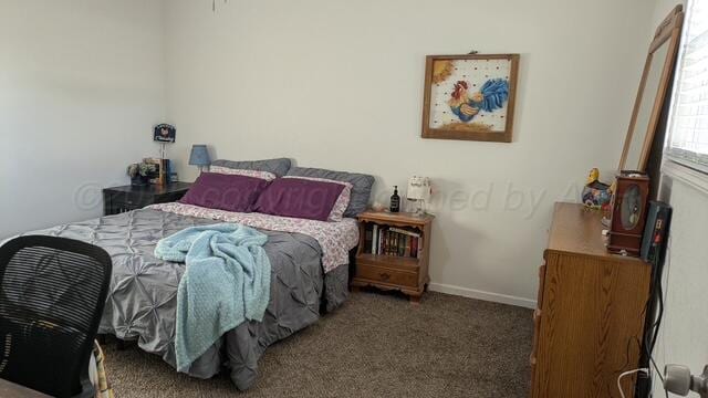 1025 Bowman Dr, Borger, TX 79007 - bedroom with carpet and baseboards