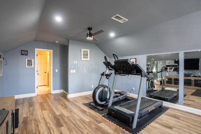 8121 Alexandria Ave, Amarillo, TX 79118 - exercise room with vaulted ceiling, wood finished floors, a ceiling fan, and baseboards