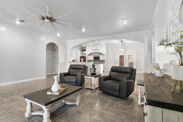 8121 Alexandria Ave, Amarillo, TX 79118 - living area featuring arched walkways, ceiling fan, baseboards, ornamental molding, and recessed lighting