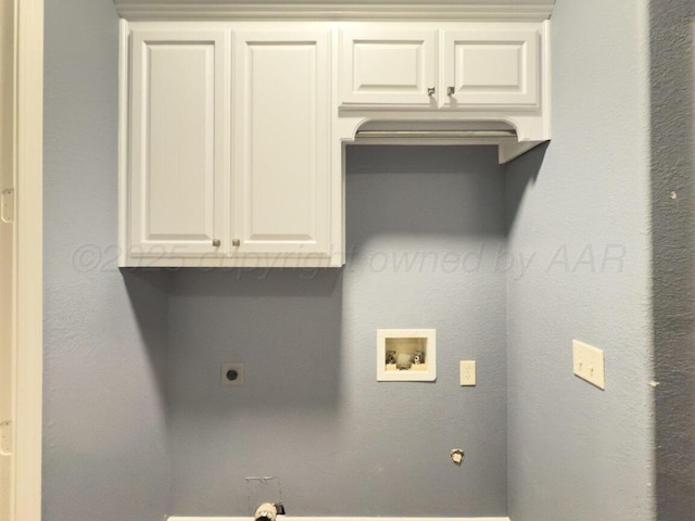 8121 Alexandria Ave, Amarillo, TX 79118 - laundry room with hookup for a washing machine, electric dryer hookup, and cabinet space