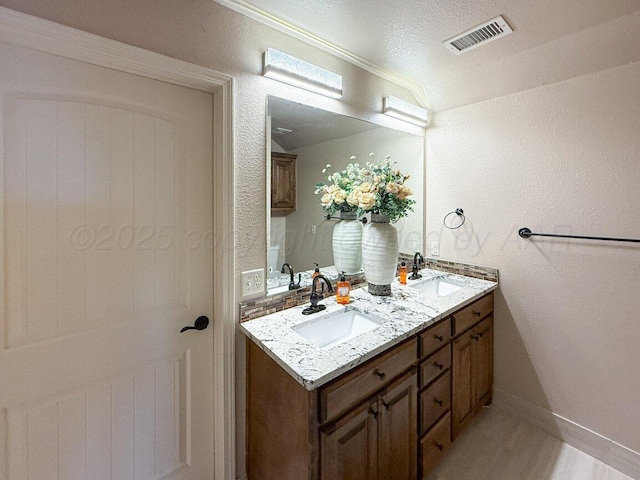8121 Alexandria Ave, Amarillo, TX 79118 - full bath featuring double vanity and ornamental molding