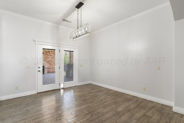 8121 Alexandria Ave, Amarillo, TX 79118 - unfurnished room with wood finished floors, baseboards, and crown molding