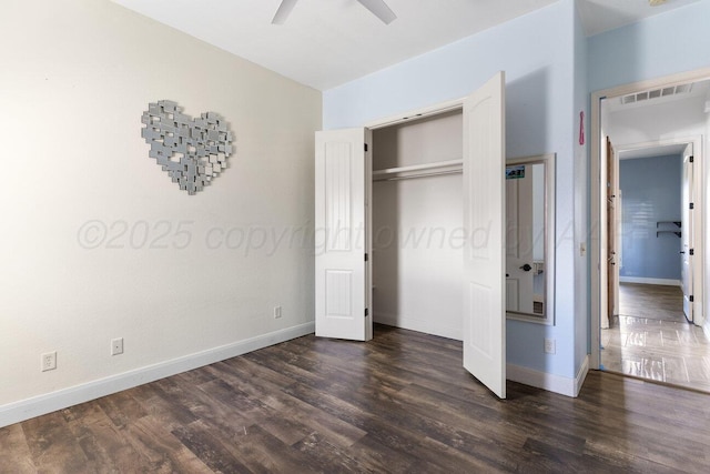 8121 Alexandria Ave, Amarillo, TX 79118 - unfurnished bedroom with dark wood finished floors, baseboards, a closet, and ceiling fan