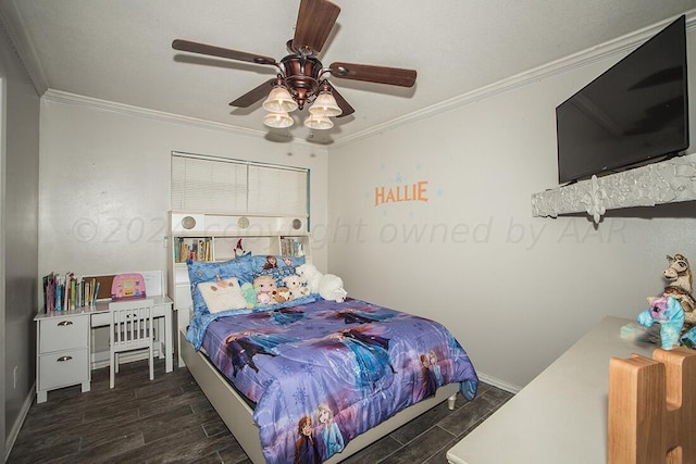 bedroom featuring dark wood-style floors, ceiling fan, baseboards, and crown molding