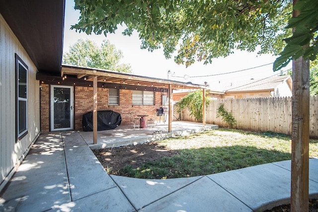 view of patio with fence