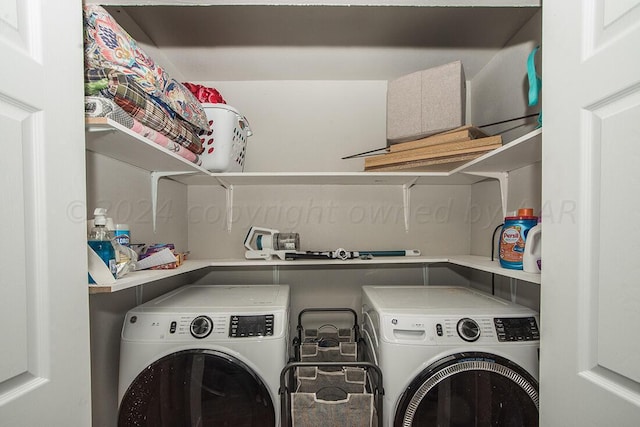 clothes washing area with laundry area and washing machine and clothes dryer