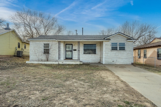 ranch-style house with central air condition unit