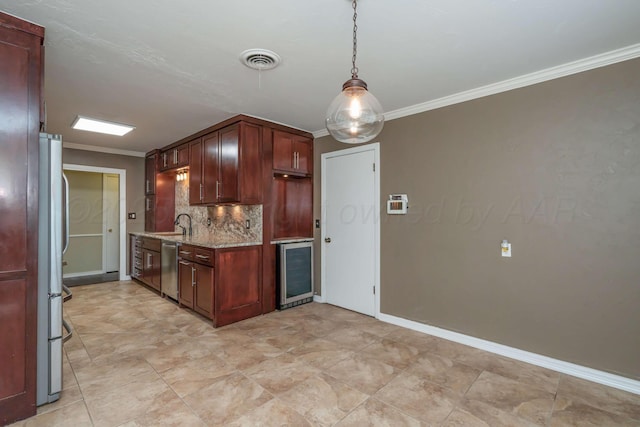 3408 Hawthorne Dr, Amarillo, TX 79109 - kitchen featuring wine cooler, crown molding, appliances with stainless steel finishes, decorative backsplash, and light stone counters