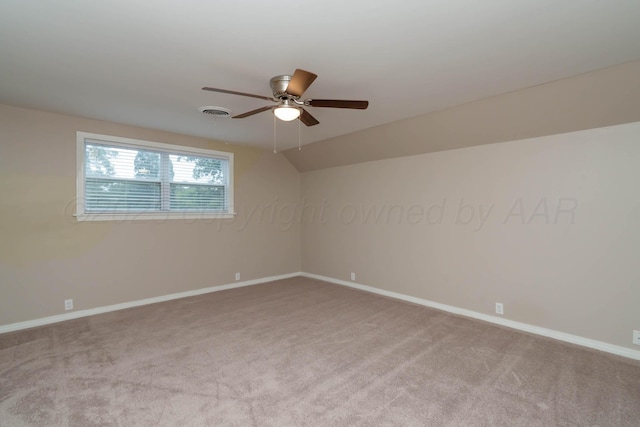 3408 Hawthorne Dr, Amarillo, TX 79109 - carpeted empty room with ceiling fan, baseboards, and lofted ceiling