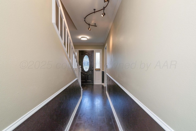 3408 Hawthorne Dr, Amarillo, TX 79109 - doorway featuring stairway, crown molding, track lighting, and baseboards