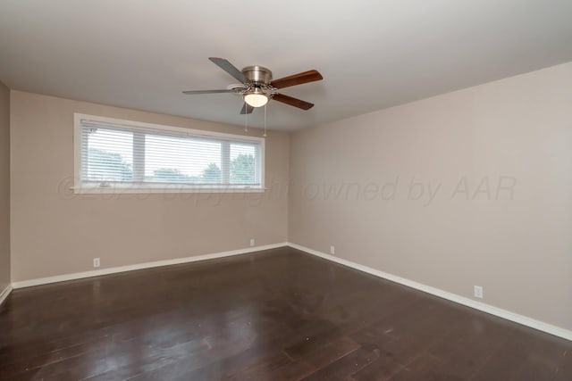 3408 Hawthorne Dr, Amarillo, TX 79109 - spare room with a ceiling fan, dark wood-type flooring, and baseboards