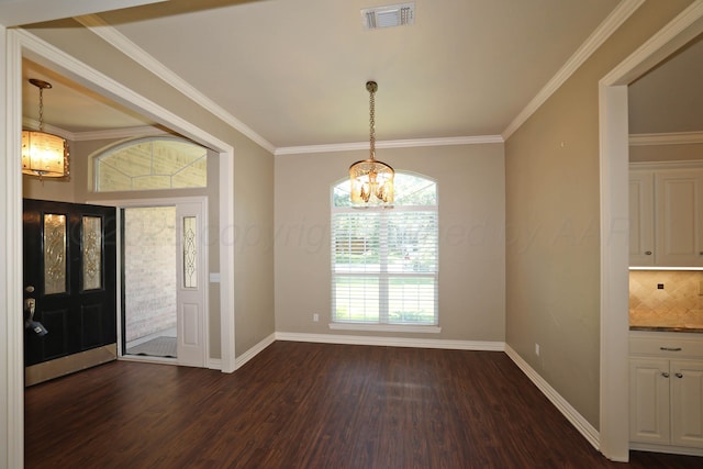 7501 Countryside Dr, Amarillo, TX 79119 - foyer with a chandelier, dark wood-style floors, baseboards, and ornamental molding