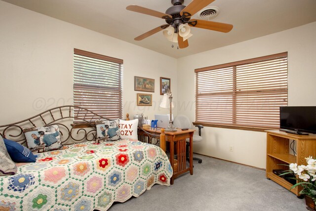 8219 Lamount Dr, Amarillo, TX 79110 - bedroom featuring carpet floors and a ceiling fan