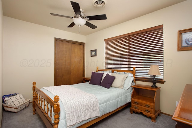 8219 Lamount Dr, Amarillo, TX 79110 - bedroom featuring carpet, a closet, and a ceiling fan