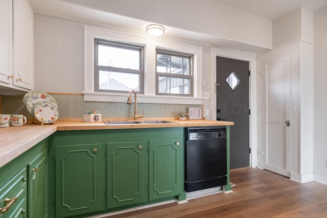 kitchen featuring sink, tasteful backsplash, dark hardwood / wood-style floors, dishwasher, and green cabinets