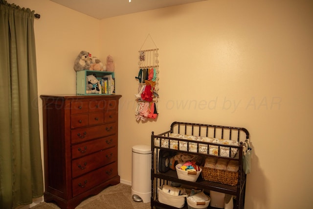 1403 Charles Ave, Panhandle, TX 79068 - carpeted bedroom featuring a nursery area and baseboards