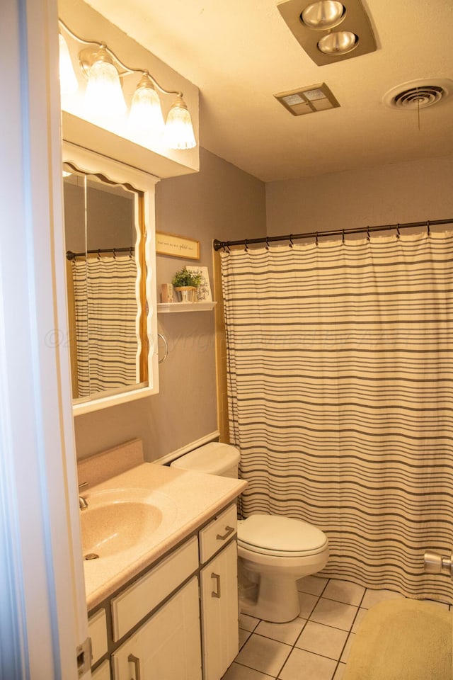 1403 Charles Ave, Panhandle, TX 79068 - bathroom featuring vanity and tile patterned floors