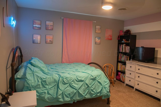 1403 Charles Ave, Panhandle, TX 79068 - bedroom featuring light colored carpet
