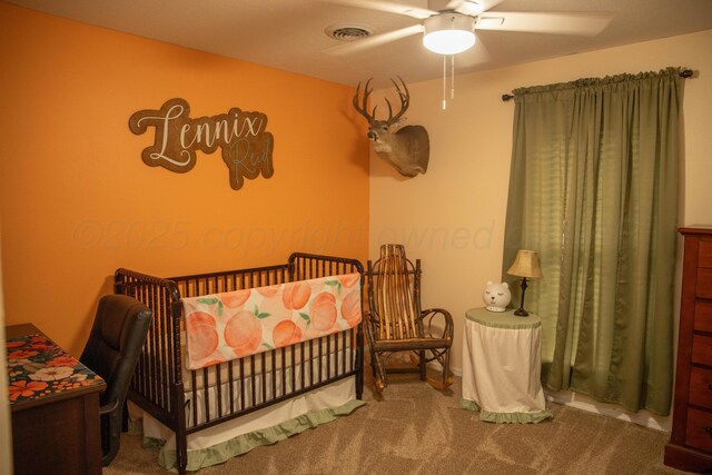 1403 Charles Ave, Panhandle, TX 79068 - bedroom with carpet flooring and a ceiling fan