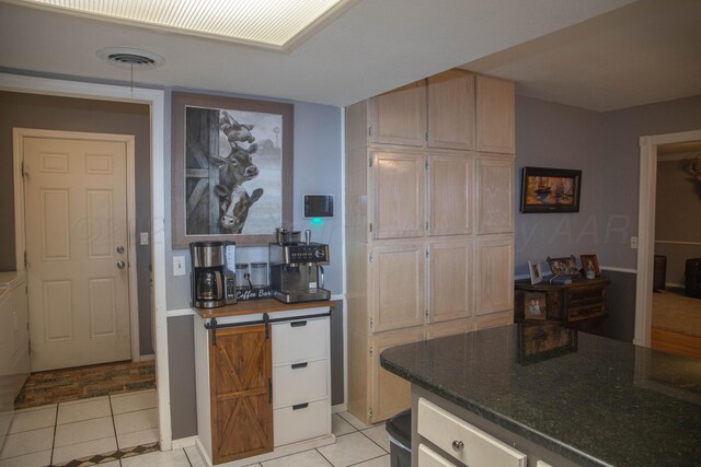 1403 Charles Ave, Panhandle, TX 79068 - kitchen with light tile patterned floors